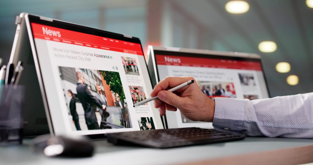 Gutenberg Optimization: Cropped shot of a male editor working on digital tablets to publish news articles